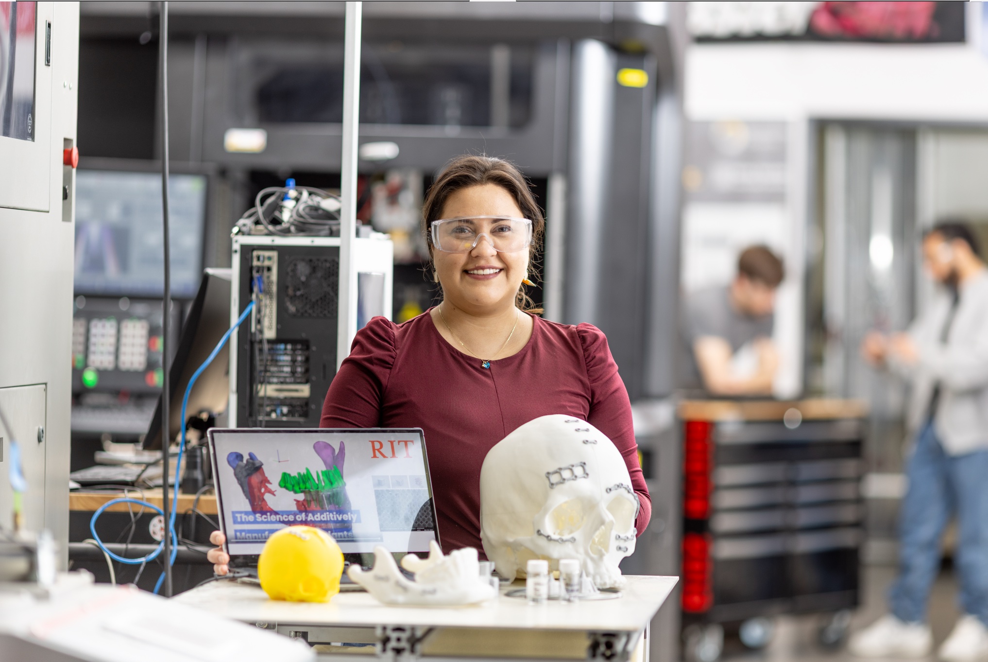 Valeria Marin in advanced manufacturing lab with medical models